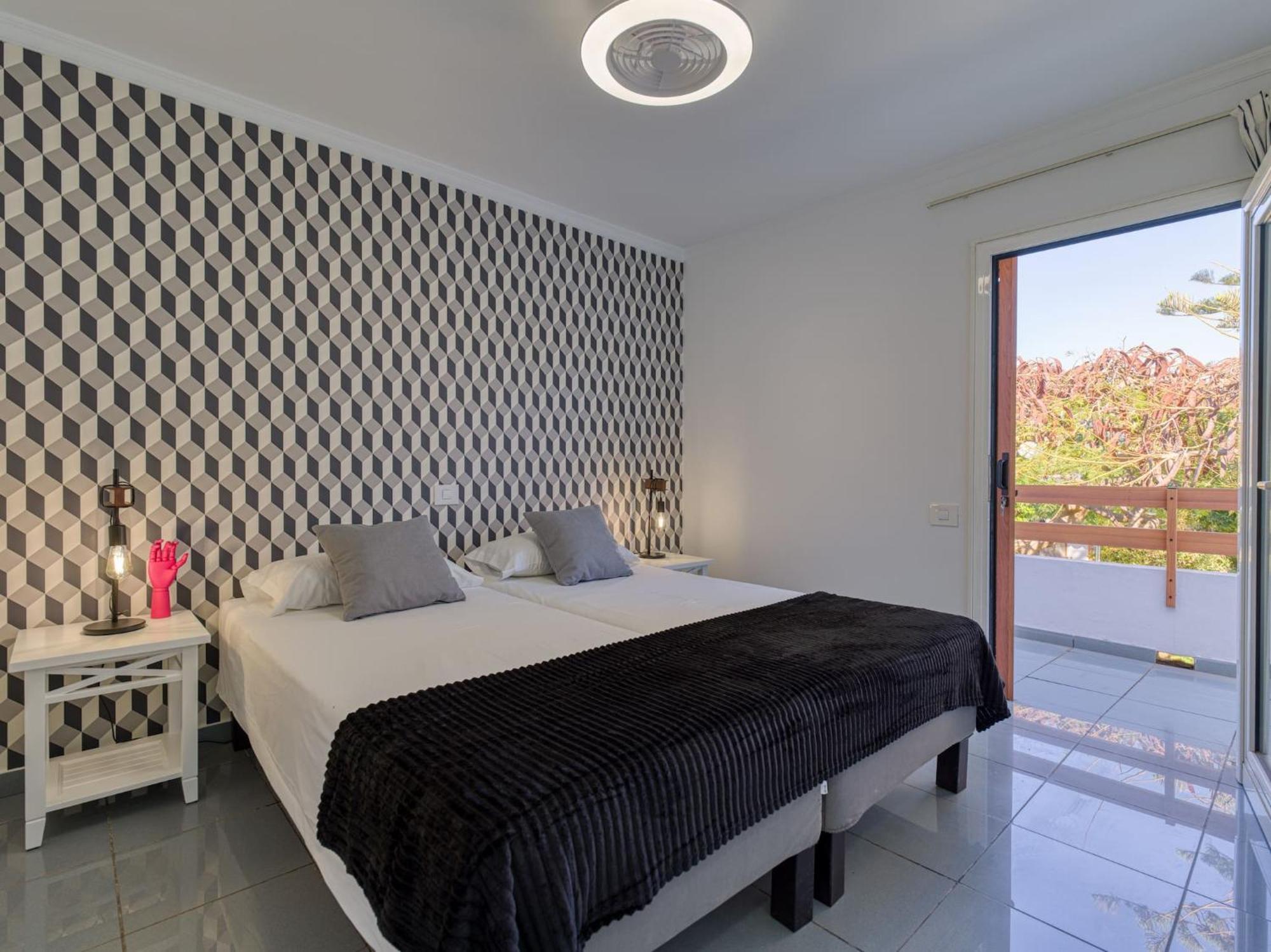 Timon Suites San Agustin Bagian luar foto