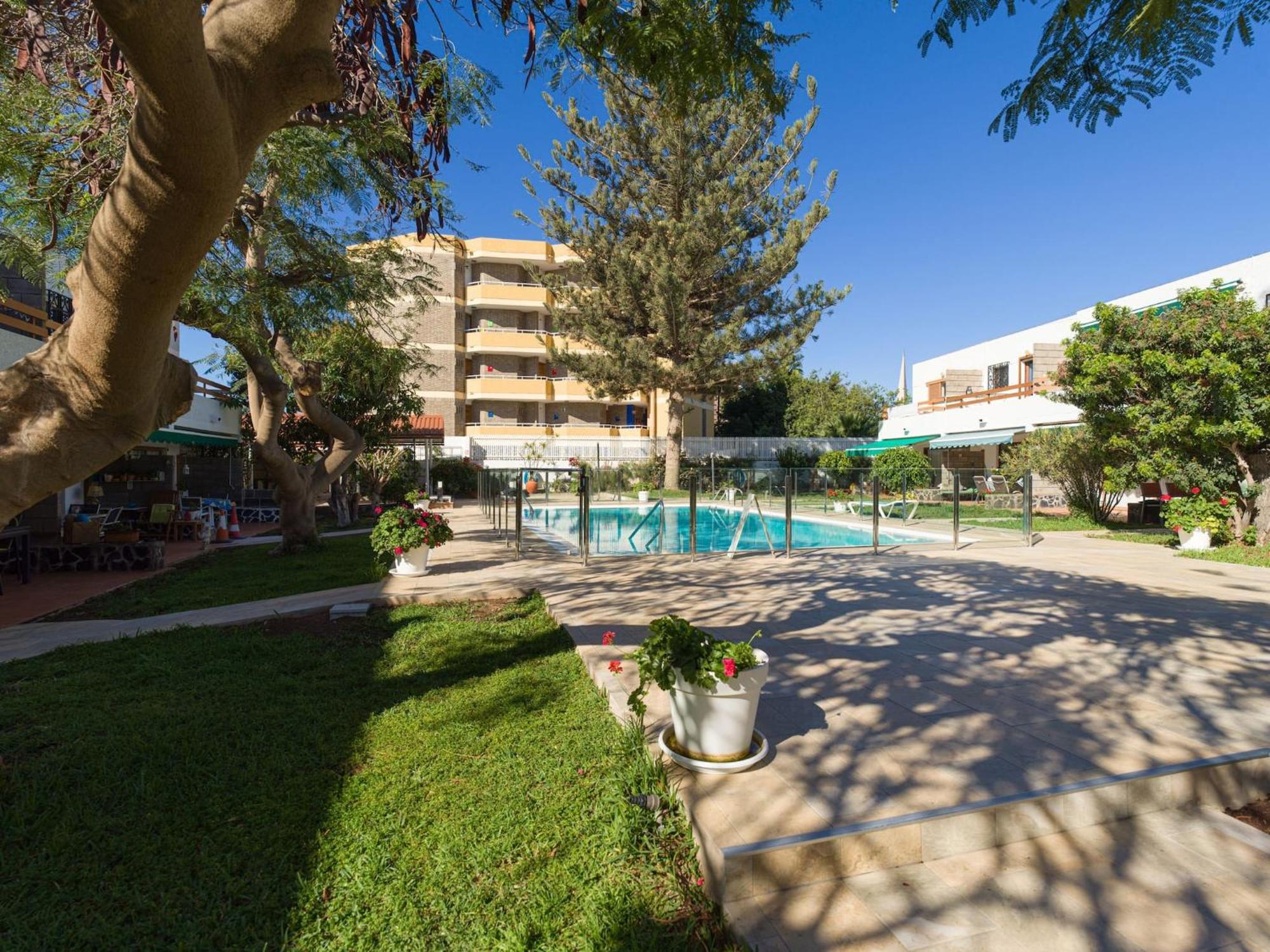 Timon Suites San Agustin Bagian luar foto
